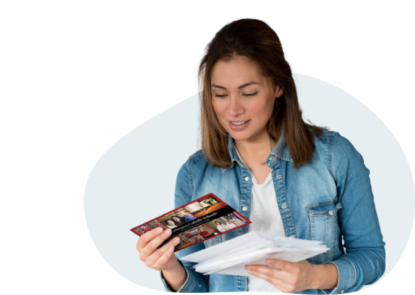 Woman_Reading_A_Direct_Mail_Postcard_Sent_From_A_Church