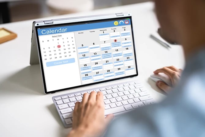 Fully booked calendar displayed on a tablet’s screen