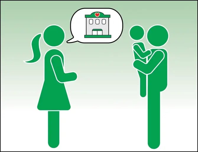 A woman recommending a childcare facility to a man holding his child
