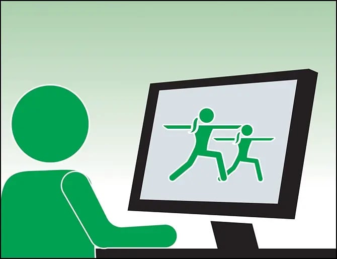 person browsing a trainer's website on a desktop computer
