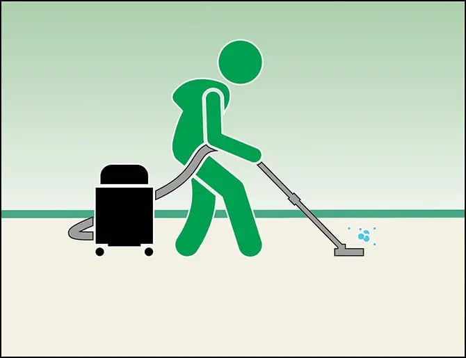 person cleaning carpet