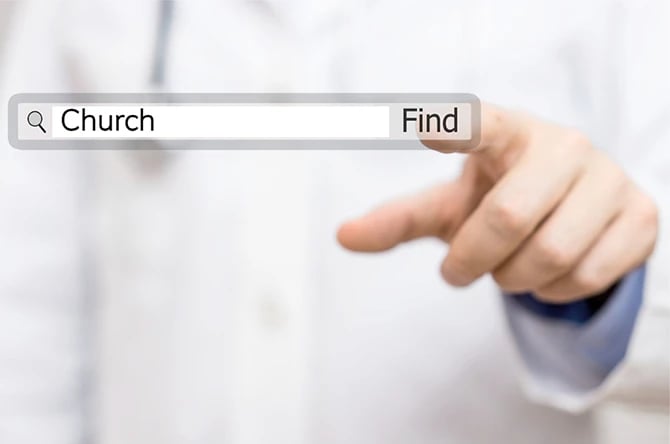 The word church on a virtual search bar with a person pressing find