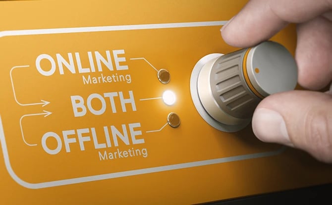 Fingers using a rotary knob to switch strategies and select both online and offline marketing channels.