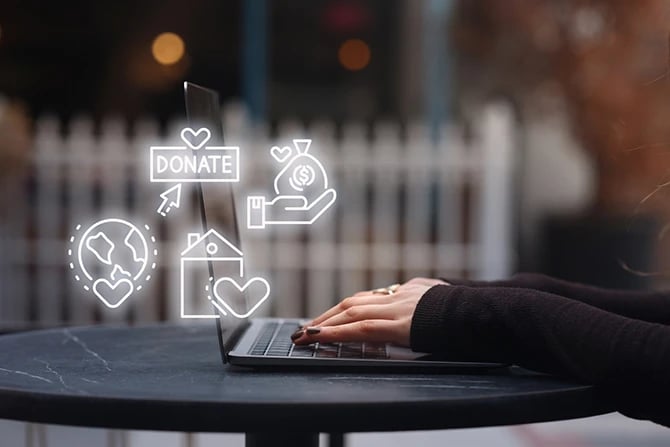 Woman using a laptop with website icons such as globe, home, and donate.