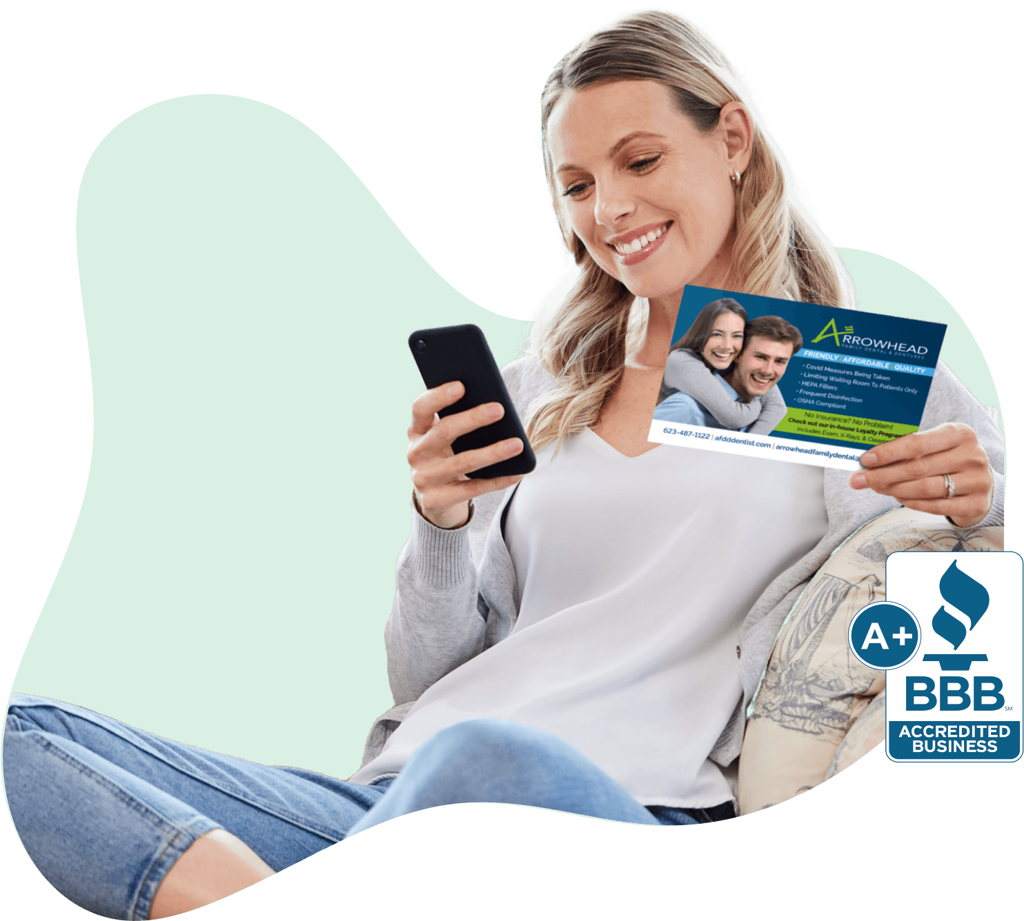 Woman_holding_direct_mail_ postcard
