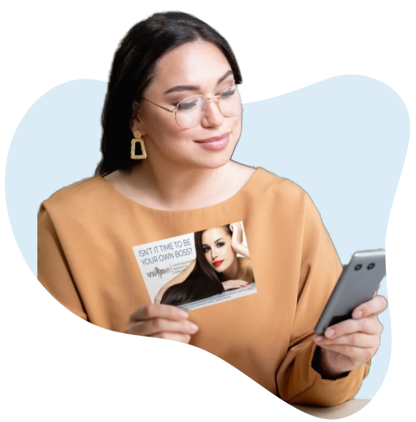 Woman_Holding_A_Direct_Mail_Postcard
